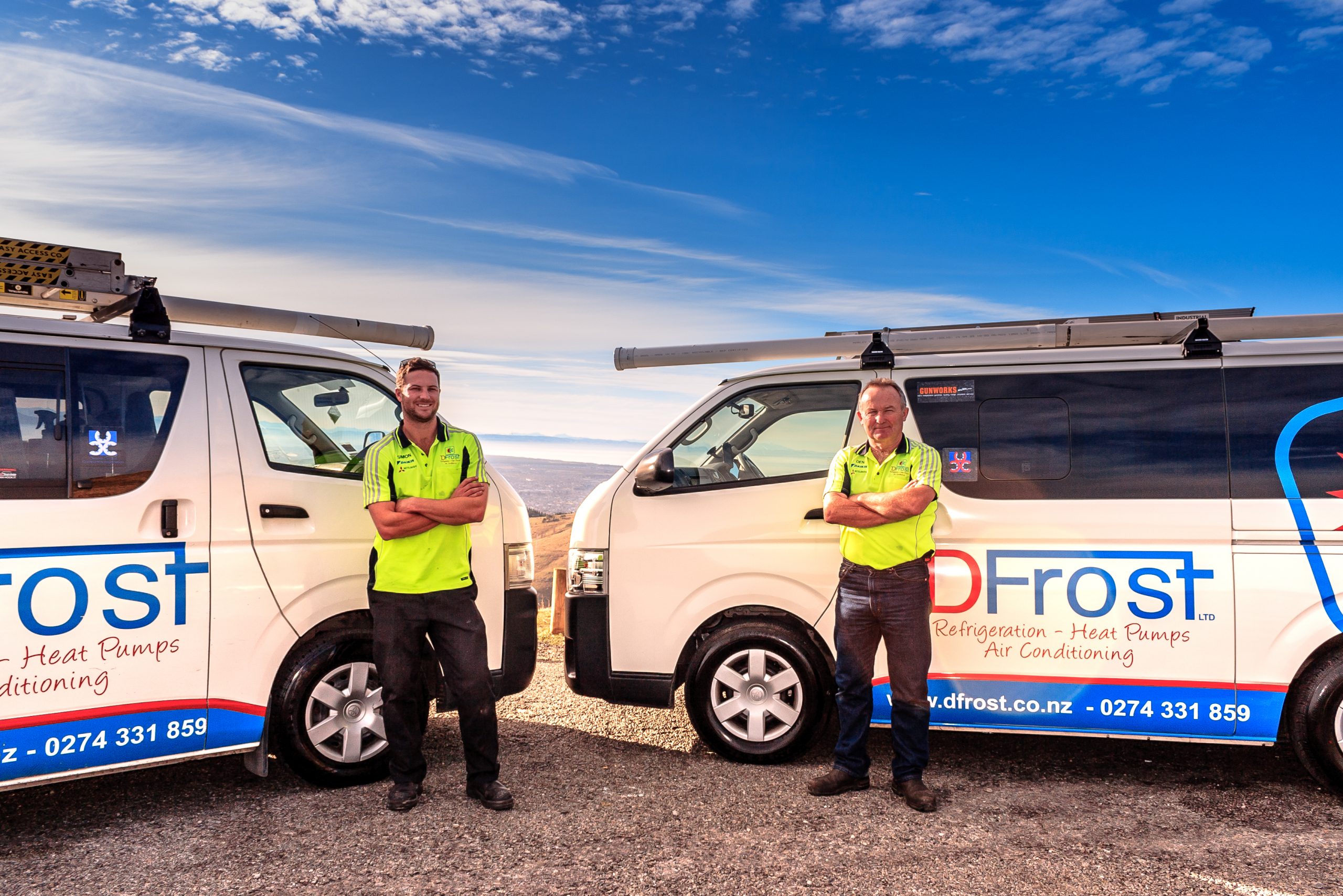 simon and dennis in front of dfrost work vans